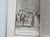 an open book with a black and white drawing of a man and a woman standing in front of a bed