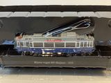 a blue and white train in a plastic box