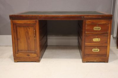 an image of a wooden desk with three drawers and two drawers