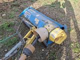 a blue and yellow machine that is laying on the ground