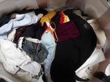 an image of a laundry basket full of clothes