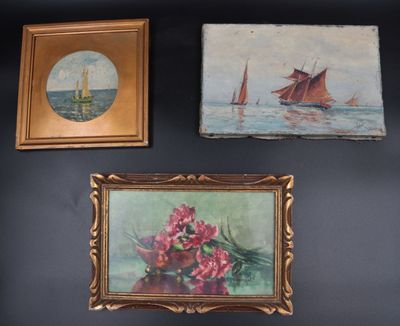 three paintings hanging on the wall above a vase of flowers