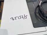 a picture of a printer with a cable on top of it