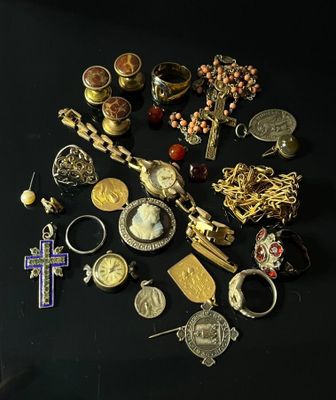 a black table with a bunch of jewelry on it