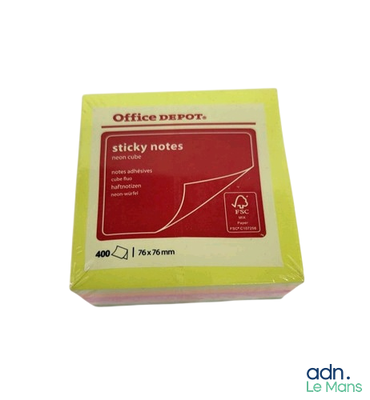 a box of sticky notes sitting on top of a table