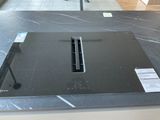 an image of a kitchen counter top with a black stove top