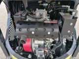 a small engine in the back of a small vehicle