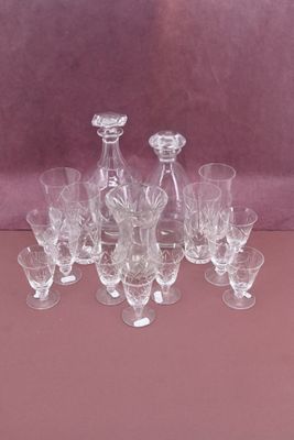 a lot of glasses that are sitting on a table