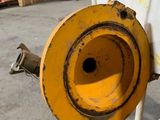 a yellow fire hydrant that is sitting in the middle of a parking lot