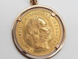 une pièce d'or « sovereign » sur laquelle figure le portrait d'un homme