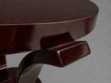 a close up of a table with a wooden top and metal legs