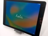 the tablet is sitting on a stand with the word rola written on it