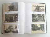 an open book with pictures of buildings on it