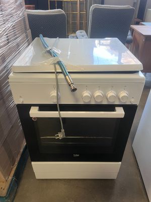 stove with a white top and a black bottom with a blue handle