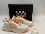 a pair of white and orange sneakers with orange laces
