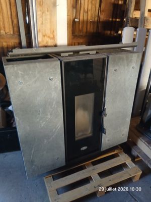 an image of a stove in a garage with a pallet