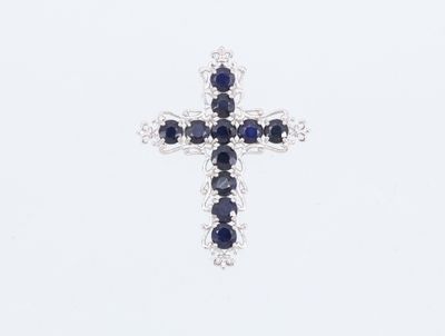 un gros plan d'une croix en losanges bleus et blancs sur fond blanc