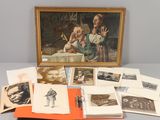 an image of a collection of old photographs and postcards on a table