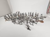 an image of a group of toy soldiers on a white surface