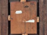 a picture of a wooden frame with a picture on it
