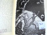 an open book with a picture of an astronaut on it