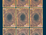 six square coasters with gold swirl designs on them on a blue background