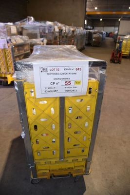 a cart with a lot of boxes on it in a warehouse