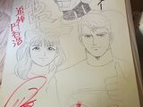 drawing of a book with a picture of a man and a woman on it
