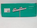 a green box with a silver handle on it