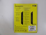 the back of a yellow box with a black label on it