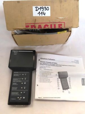 an image of a box with a remote control and a box with instructions