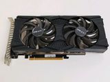 a close up of a video card with two fans on it