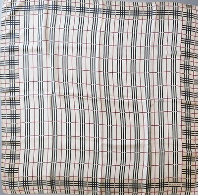 a close up of a purse on a table