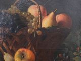 painting of a basket of fruit on a ledge with a pear, oranges, grapes, and pears