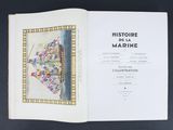 un livre ouvert sur lequel figure l'image d'une carte