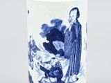 an image of a blue and white cup with a picture of a man and a woman