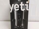 the box is open on a white surface with a black and white photo of a coffee maker