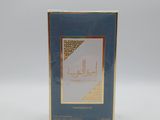 an image of a box of perfume sitting on top of a white surface