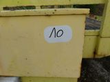 a sign that says no on the side of a yellow truck