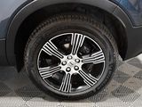 a close up of a tire on a car ' s rim