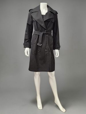 a black trench coat on a mannequin mannequin mannequin mannequin mannequin mannequin mannequin mannequin manne