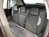the back seats of a car are empty in the back of the car