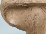 marble bust of a woman with a hat on her head