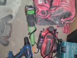 a lot of tools that are laying out on the floor