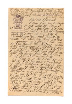 une lettre écrite en cursive sur une feuille de papier