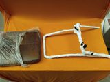 a piece of luggage that has been wrapped up and is sitting on a table