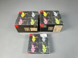 three boxes of the rolling stones album are sitting on a table