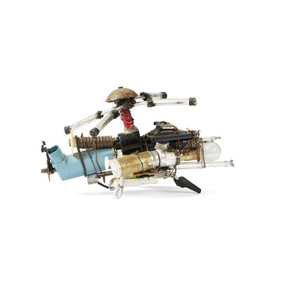 a small model of a motorcycle with a motorbike attached to it