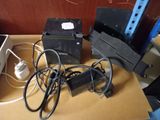 a lot of wires and cords on the table