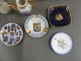a lot of different plates and cups on the table